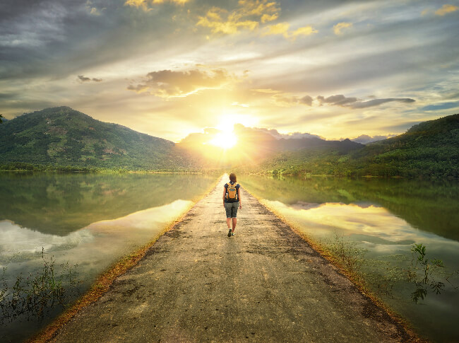 Someone walking down a road