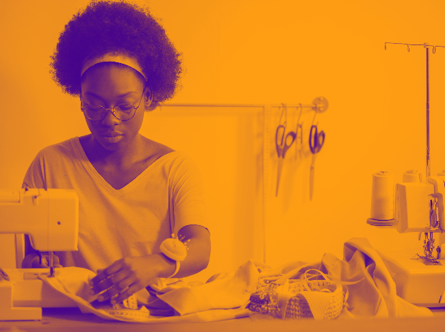A black  woman sewing as a hobby