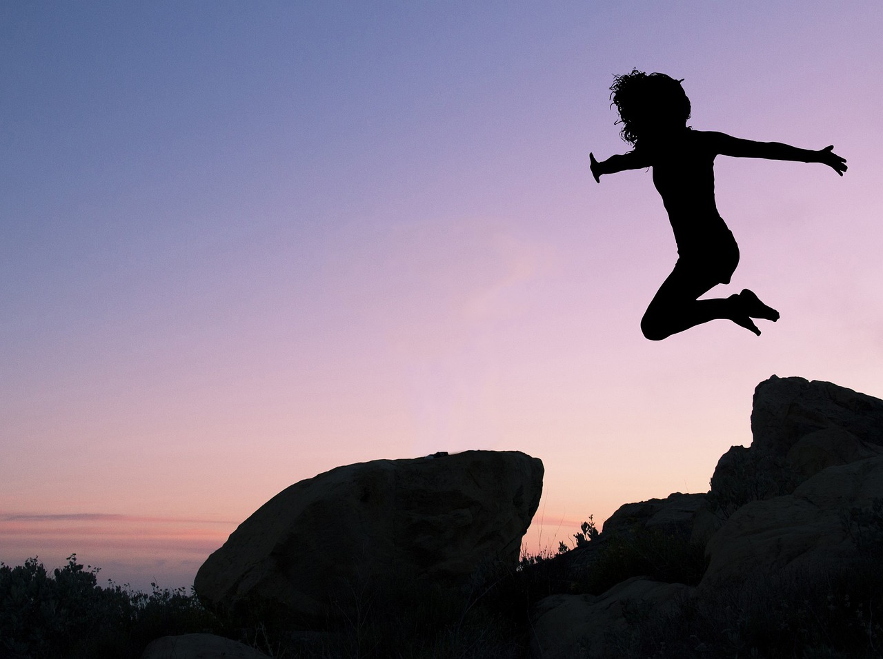 Woman jumping -- finding joy through passion