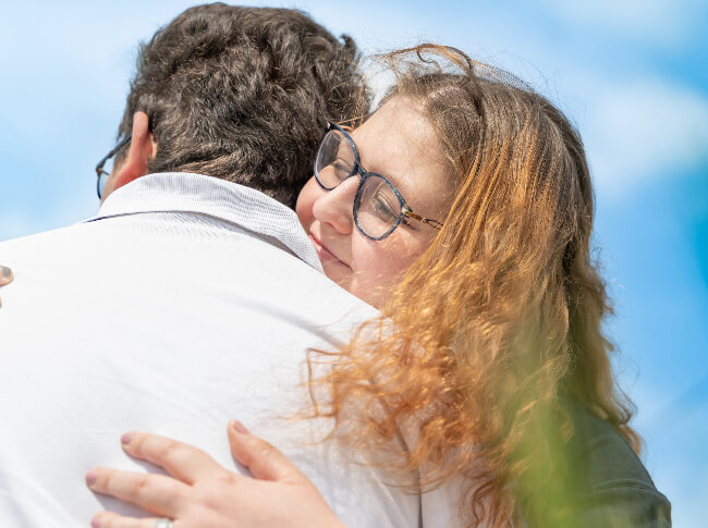 the power of attachment - two people hugging